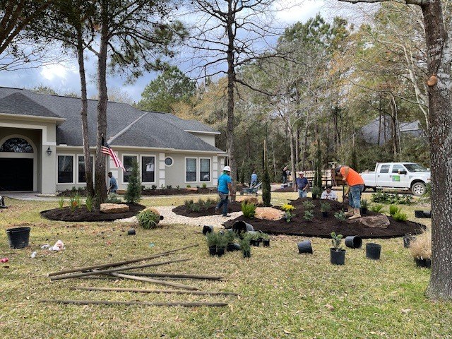 Front-Yard River Rock Planted Beds V in Magnolia, TX