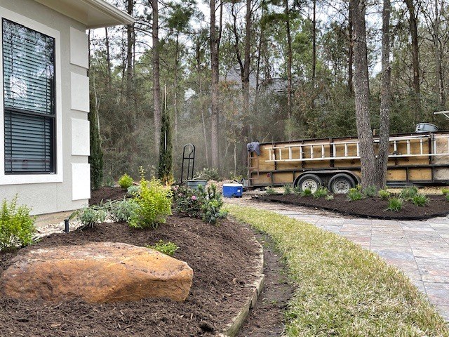 Front-Yard River Rock Planted Beds XI in Magnolia, TX