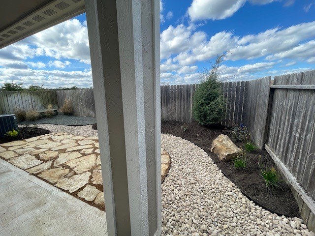 Flagstone patio and dry creek bed in Montgomery County — after
