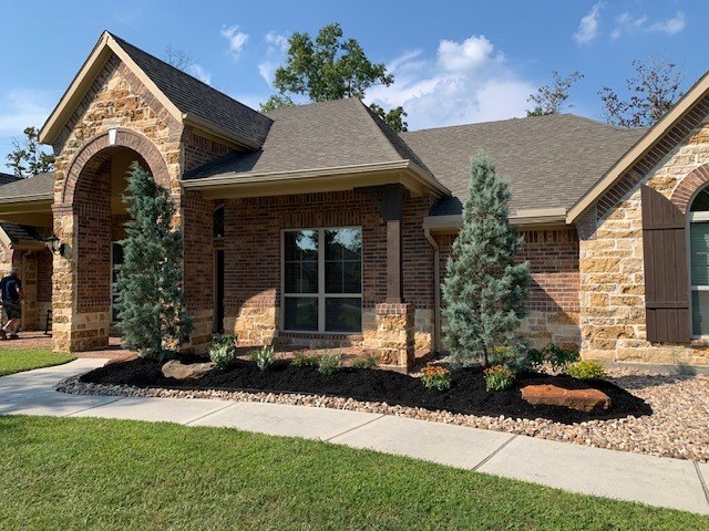 Front-yard planted beds in Conroe, TX — after