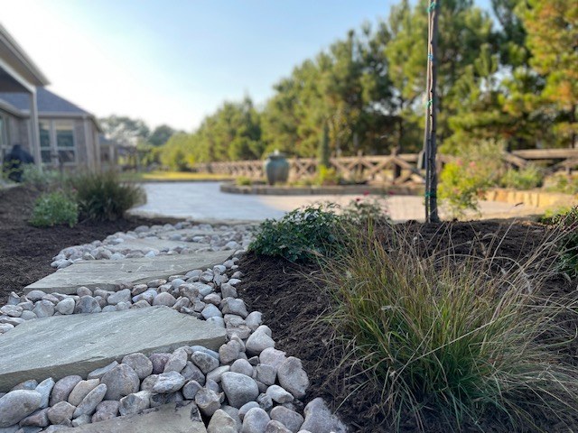 Bubbling vase and flagstone terrace in Hill Country — after