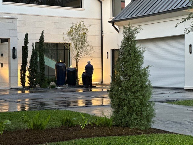 Water urns and landscape lighting in Bentwater, Montgomery — after